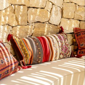 Cushion embroidered with ethnic patterns